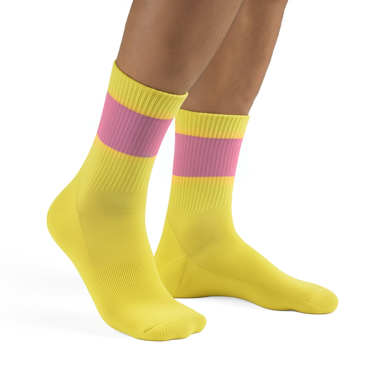 Yellow socks with pink stripes worn by a person on a white background (Pink)