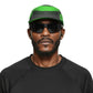 Man wearing a green and black cap and sunglasses on a white background (Green)