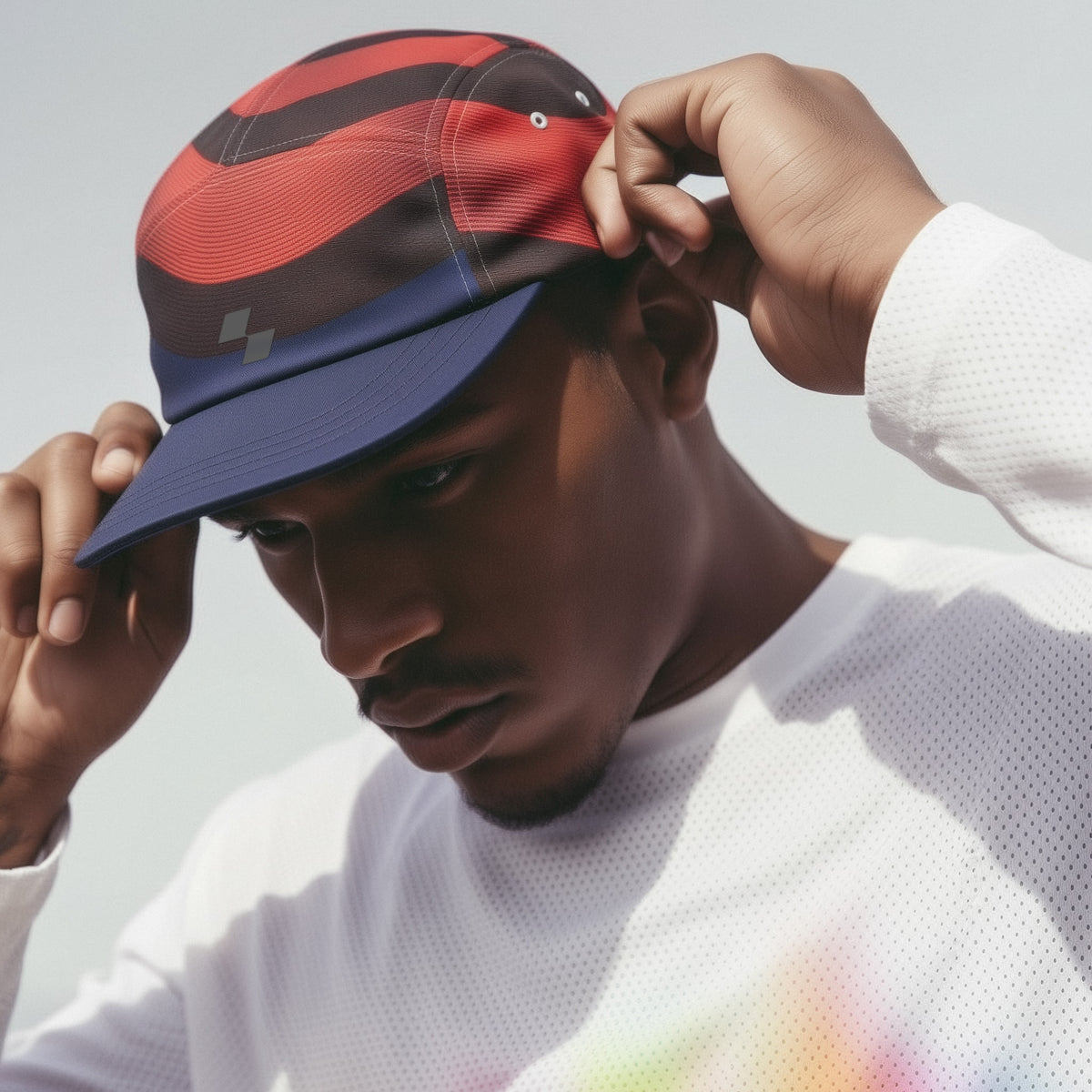 Person wearing a colorful cap with a blurred background (Red)