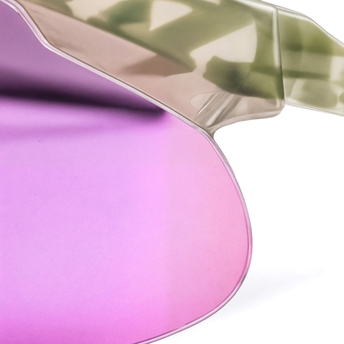 Close-up of a pink and green makeup product on a white background (Violet)