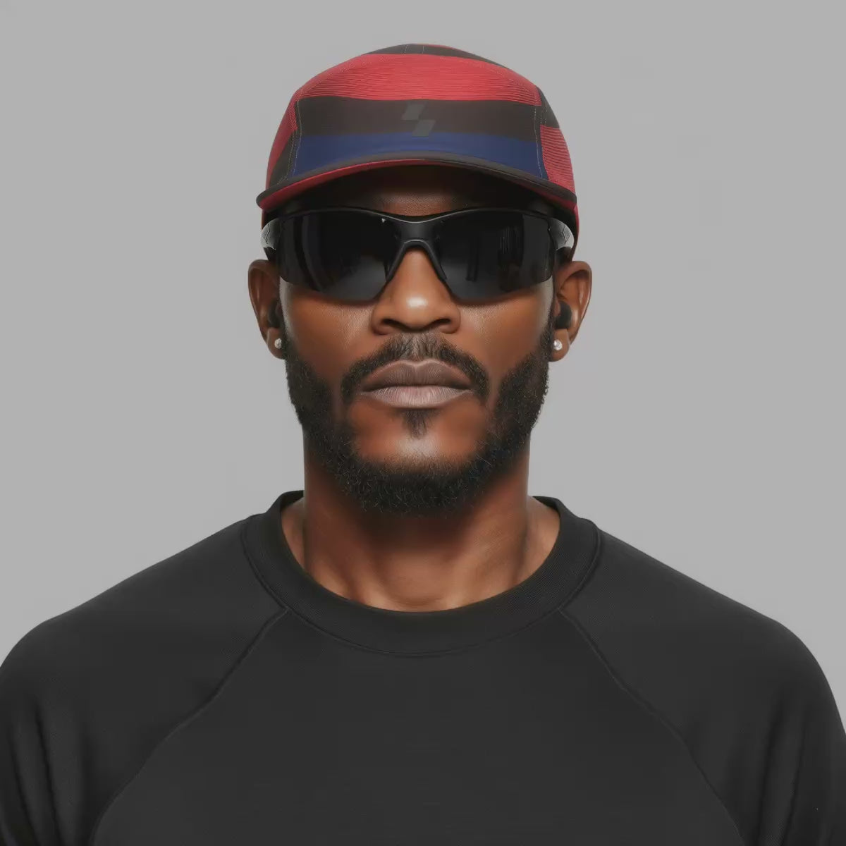 Multicolored cap with red, black, and blue design on a white background (Red)