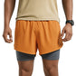 Person wearing a beige top and two-tone shorts on a white background (Orange)